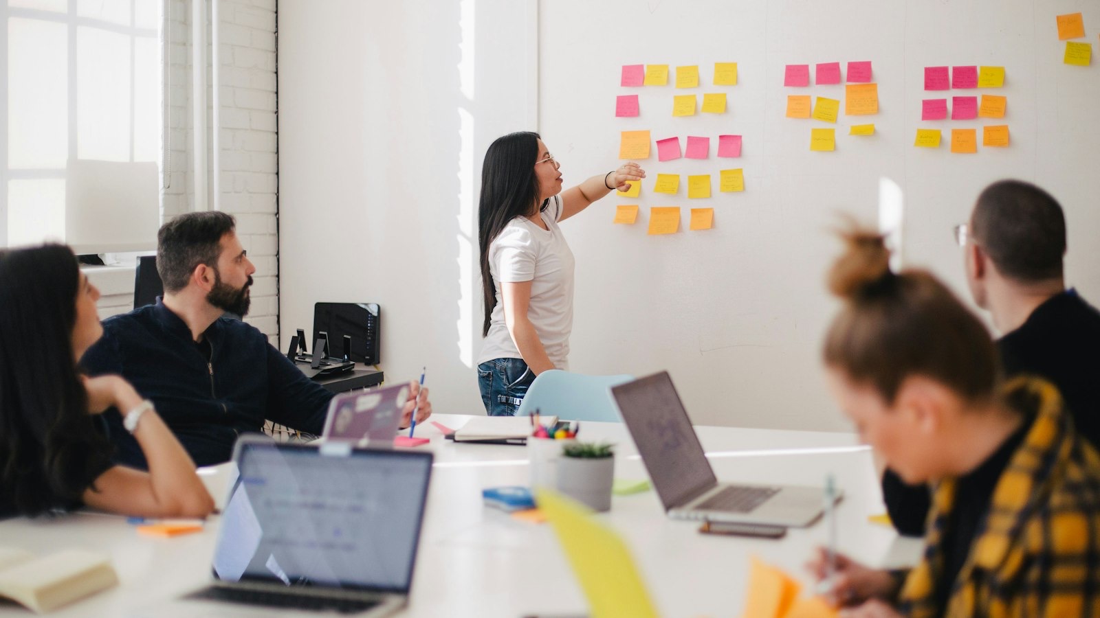 Founder in a discovery call reviewing a proposal with a mobile app development team