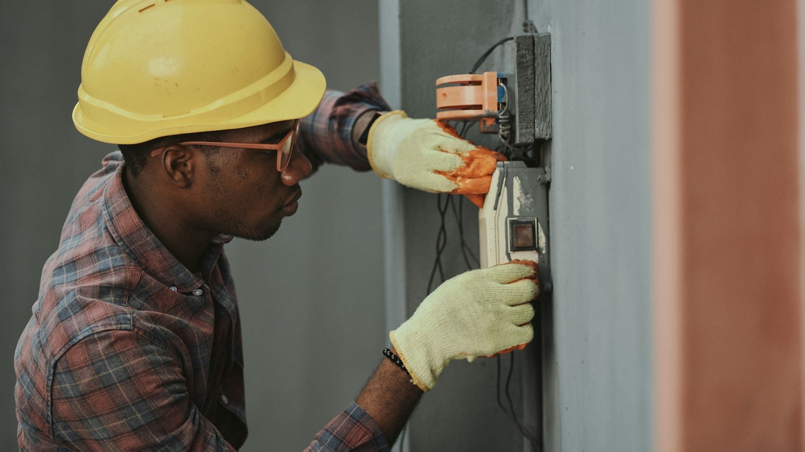 Tradesperson using a mobile app on a job site